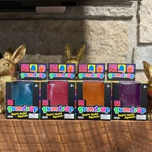 🌈🐰Full set! NeeDoh Gumdrops Squish! 4-Pack - Blue, Red, Orange, Purple